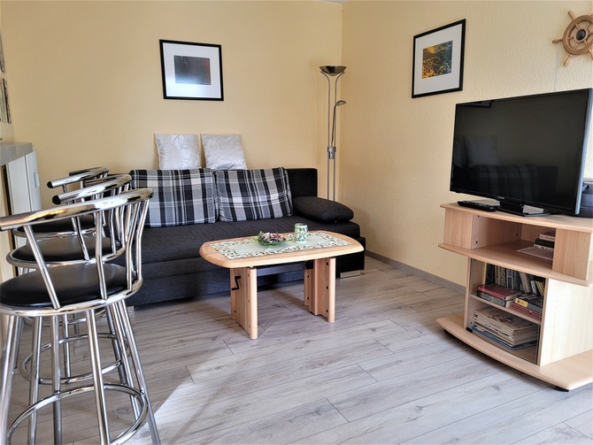 Ferienwohnung in Graal-M&uuml;ritz - Steinh&ouml;fel - Wohnzimmer Sitzecke