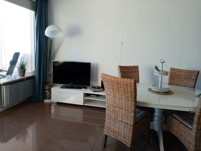Ferienwohnung in Sierksdorf - Meerblick-Ferienwohnung - Haus A / App. 252 - Wohn- und Essbereich mit Meerblick