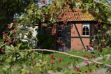 Ferienwohnung in Rettin - Bauernferienhof Kluvetasch Ostseekrabbe - Grillh&auml;uschen