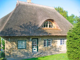 Ferienhaus in D&ouml;hnsdorf - Landhaus Unter dem Reetdach - Gartenansicht