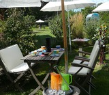 Ferienwohnung in Wieck a. Dar&szlig; - Aalreuse 2 - hochwertige bequeme Gartenm&ouml;bel mit Sonnenschirmen
