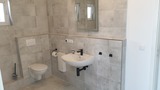 Ferienwohnung in B&ouml;rgerende - Appartement 1 - Familiensuite - Badezimmer mit Walk-in-Dusche