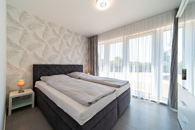 Ferienwohnung in B&ouml;rgerende - Appartement 2 - D&uuml;nenblick - 11qm Schlafzimmer