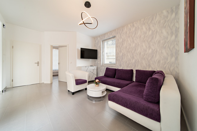 Ferienwohnung in B&ouml;rgerende - Appartement 2 - D&uuml;nenblick - 13qm Wohnzimmer mit Schlafcouch