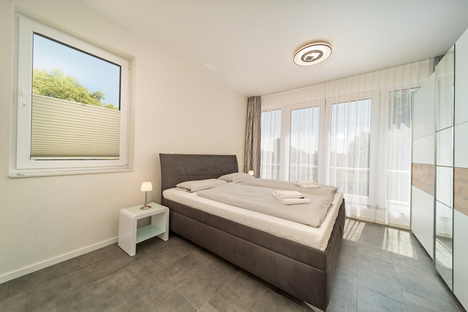 Ferienwohnung in B&ouml;rgerende - Appartement 5 - Traumblick - Schlafzimmer