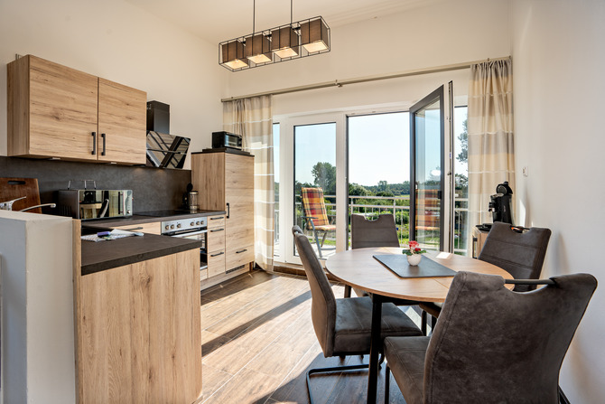 Ferienwohnung in B&ouml;rgerende - Appartement 5 - Traumblick - K&uuml;che mit Blick S&uuml;dbalkon