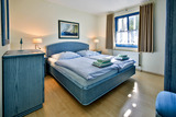 Ferienwohnung in Ostseeheilbad Zingst - Whg B, Ihr Urlaubszuhause - Schlafzimmer mit Doppelbett