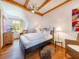 Ferienwohnung in Garz - Ferienwohnung - R&uuml;genbrise mit Seeblick mit 3 B&auml;dern, Steg und Paddelboot - alle inklusive - Bild 1