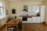 Ferienwohnung in Neuenkirchen (R&uuml;gen) - Gutshaus Grubnow Ferienwohnung 2 am Wasser Sauna und WLAN incl. - Bild 3